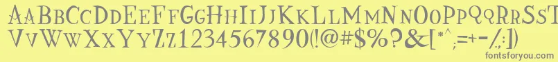 フォントNine – 黄色の背景に灰色の文字