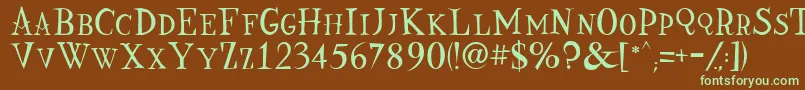 フォントNine – 緑色の文字が茶色の背景にあります。