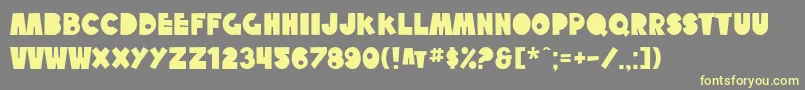 SfTattleTales Font – Yellow Fonts on Gray Background