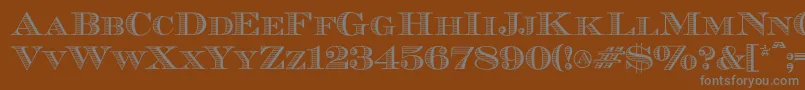 Ecuyerdax Font – Gray Fonts on Brown Background