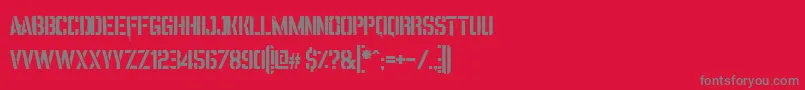フォントItomiVincaStencil – 赤い背景に灰色の文字