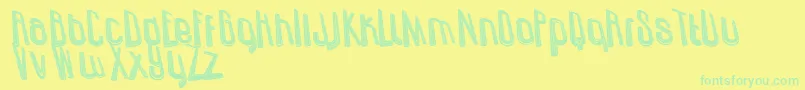 UzundurazDirty Font – Green Fonts on Yellow Background