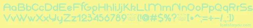 AkajuDemo-fontti – vihreät fontit keltaisella taustalla