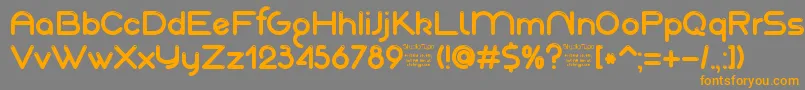 フォントAkajuDemo – オレンジの文字は灰色の背景にあります。