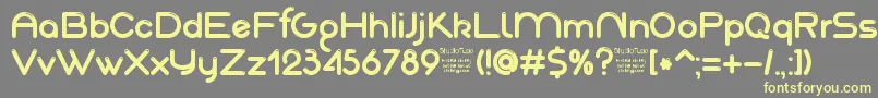 AkajuDemo-fontti – keltaiset fontit harmaalla taustalla