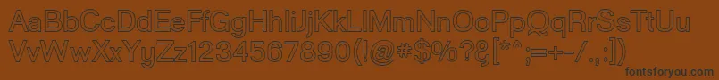 GoulongBoldOuline-fontti – mustat fontit ruskealla taustalla