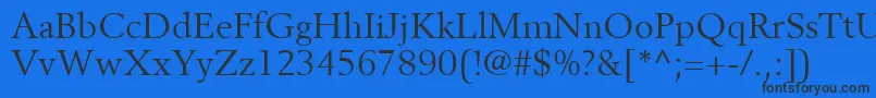 BerlingLtRoman-Schriftart – Schwarze Schriften auf blauem Hintergrund