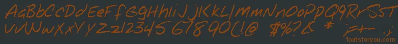 NotepadRegular-fontti – ruskeat fontit mustalla taustalla
