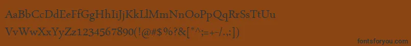 Шрифт ArabicTypesetting – чёрные шрифты на коричневом фоне