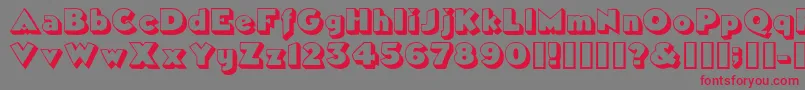 フォントTricorneoutlinesskBold – 赤い文字の灰色の背景