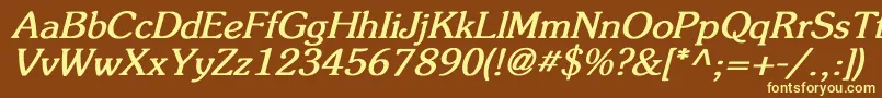 FlicknerBoldItalic-fontti – keltaiset fontit ruskealla taustalla
