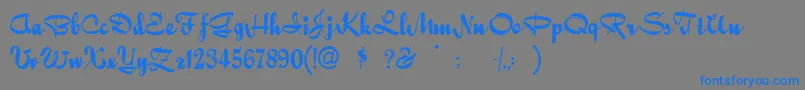 Quigleywiggly-Schriftart – Blaue Schriften auf grauem Hintergrund