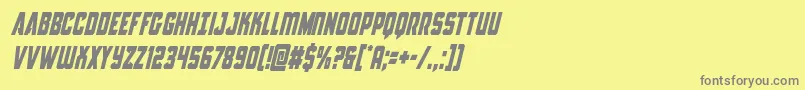 フォントAntillescondital – 黄色の背景に灰色の文字