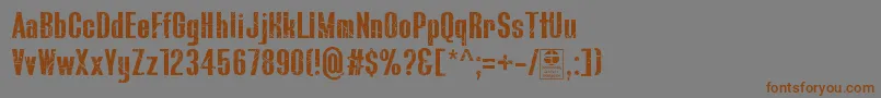 フォントBluefishScratchedDemo – 茶色の文字が灰色の背景にあります。