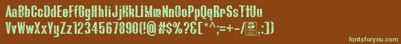 フォントBluefishScratchedDemo – 緑色の文字が茶色の背景にあります。