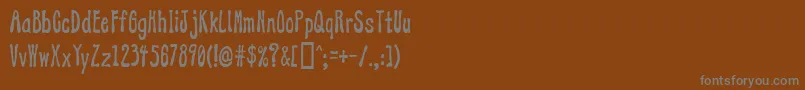 フォントAddjazz – 茶色の背景に灰色の文字