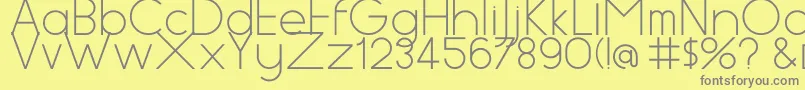 フォントAspex – 黄色の背景に灰色の文字