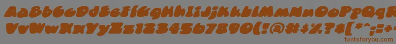 Czcionka DuncecapbbItal – brązowe czcionki na szarym tle