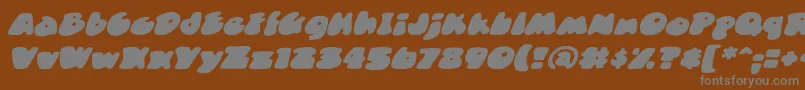 Weitere Informationen zur DuncecapbbItal-Schriftart DuncecapbbItal-Schriftart – Graue Schriften auf braunem Hintergrund