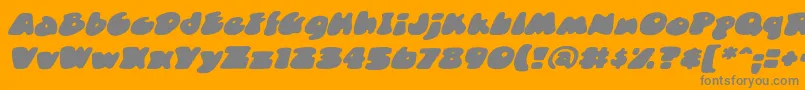DuncecapbbItal-Schriftart – Graue Schriften auf orangefarbenem Hintergrund