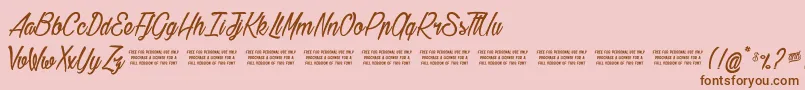 Gilliehilda-Schriftart – Braune Schriften auf rosa Hintergrund