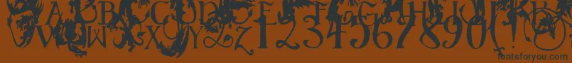 EgDragonCaps Font – Black Fonts on Brown Background