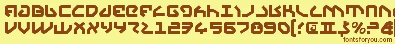 フォントYahren – 茶色の文字が黄色の背景にあります。