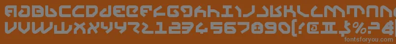 Yahren-fontti – harmaat kirjasimet ruskealla taustalla
