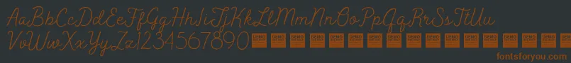 Шрифт PeakTimesDemo – коричневые шрифты на чёрном фоне