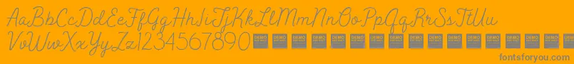 Шрифт PeakTimesDemo – серые шрифты на оранжевом фоне