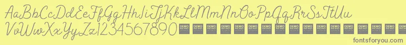 フォントPeakTimesDemo – 黄色の背景に灰色の文字