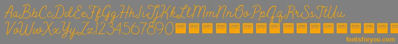 PeakTimesDemo-Schriftart – Orangefarbene Schriften auf grauem Hintergrund