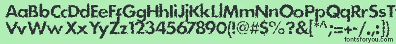 フォントStain – 緑の背景に黒い文字
