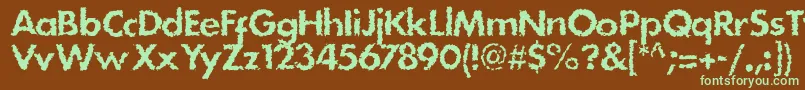 フォントStain – 緑色の文字が茶色の背景にあります。