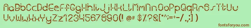 Kingscross Font – Brown Fonts on Green Background