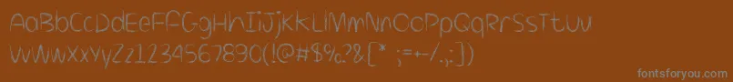 フォントKillingLoneliness – 茶色の背景に灰色の文字