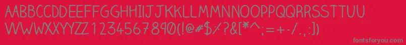 フォントClairehandregularWebfont – 赤い背景に灰色の文字