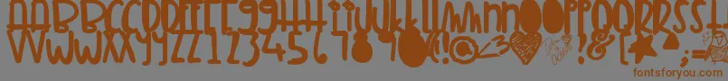 Tunamelt-Schriftart – Braune Schriften auf grauem Hintergrund
