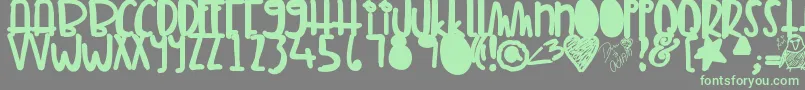 Tunamelt-Schriftart – Grüne Schriften auf grauem Hintergrund