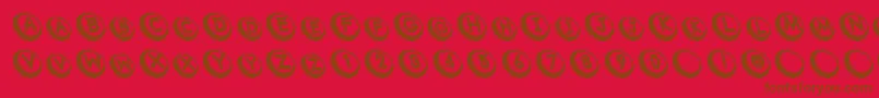 Com-Schriftart – Braune Schriften auf rotem Hintergrund