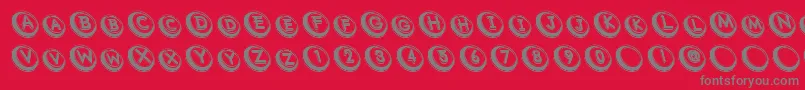 Com Font – Gray Fonts on Red Background