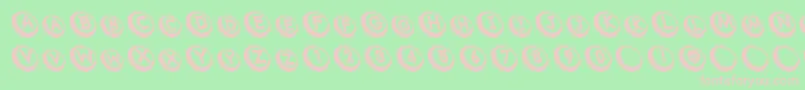 Com Font – Pink Fonts on Green Background