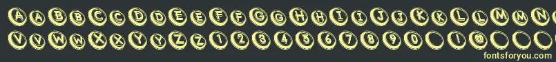 Com Font – Yellow Fonts on Black Background