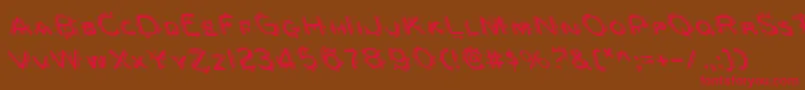 フォントBerserkerLeftalic – 赤い文字が茶色の背景にあります。