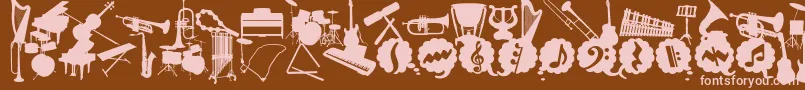 Czcionka WcMusicaBta – różowe czcionki na brązowym tle