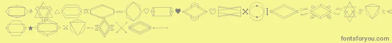 HbmSerenitySymbolism Font – Gray Fonts on Yellow Background