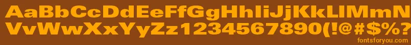 フォントUniversltstdXblackex – オレンジ色の文字が茶色の背景にあります。
