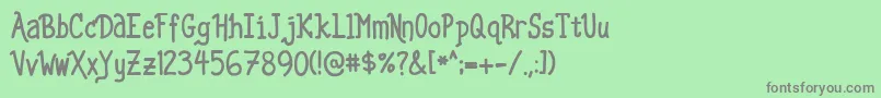Sourmilk01-Schriftart – Graue Schriften auf grünem Hintergrund