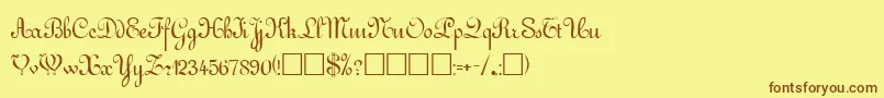 フォントGuddarpRegular – 茶色の文字が黄色の背景にあります。