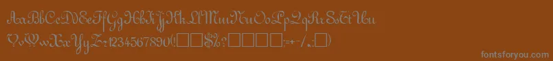 フォントGuddarpRegular – 茶色の背景に灰色の文字